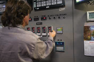 Person working at the central heating plant